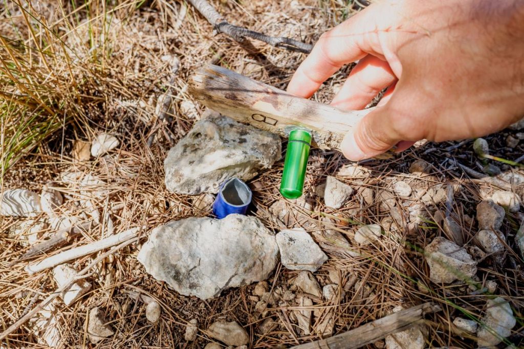 finding a geocache in the forest